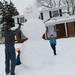 David Rink places an arm into a giant snowman as his sons Justin, 8 and Brandon, 6, stand by on Wednesday, Feb. 27, 2013 on Glen Leven Rd. Melanie Maxwell I AnnArbor.com